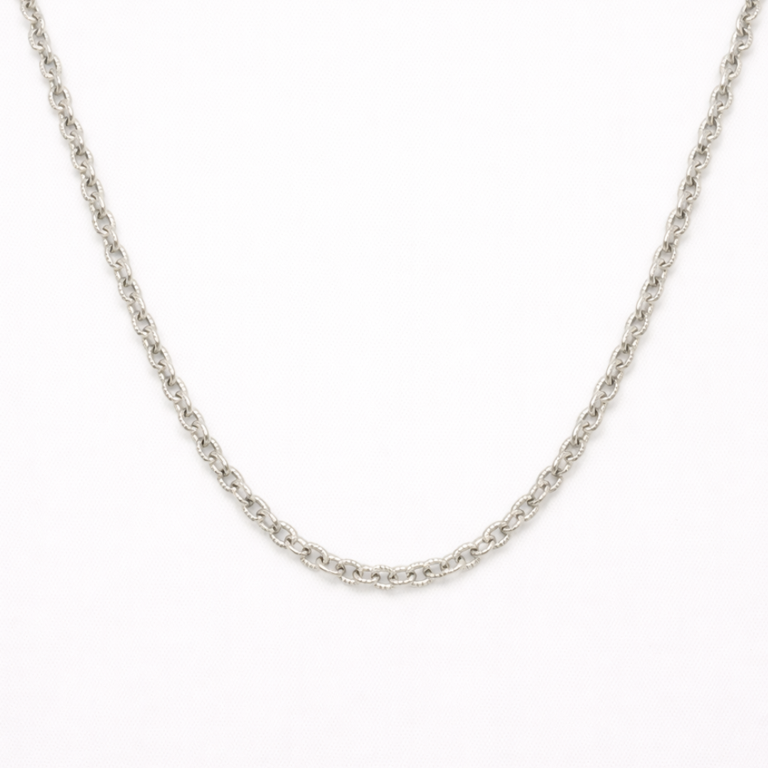 The Necklace | Create Your Own Silver by Salty Dreamers features interlocking round links in a handmade design, adding elegance to any surfer jewelry collection. Shown against a plain white background.