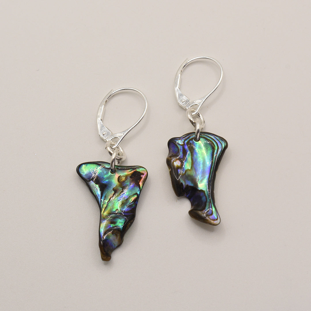 Salty Dreamers Earrings | Paua Shell Toroa feature handmade pāua shell pendants with unique iridescence and 925 silver lever-back hooks, shown on a plain light background.
