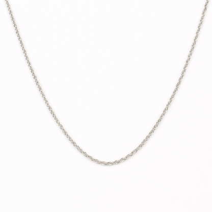 The Salty Dreamers Necklace | Create Your Own Silver features a thin stainless steel chain with small interlocking links, shown against a plain white background—an ideal choice for fans of subtle surfer jewelry.