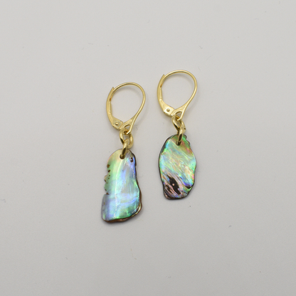 Salty Dreamers' Earrings | Paua Shell Kaha feature handmade, irregular New Zealand abalone shell pieces with gold lever-back hooks, displayed on a plain white background.