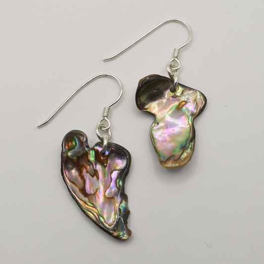 Salty Dreamers' Earrings | Paua Shell Whenua feature handmade, irregularly shaped iridescent pāua shell pendants on 925 silver hooks, shown against a plain white background.
