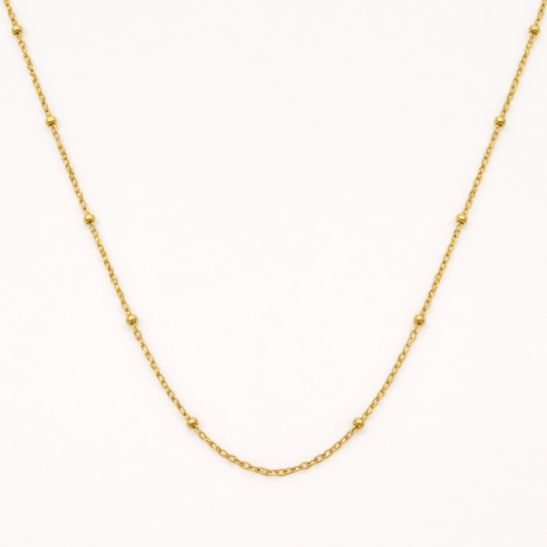 The "Necklace | Create Your Own Silver" by Salty Dreamers is a delicate chain adorned with small, evenly spaced beads, shown on a white background—an elegant handmade piece inspired by surfer jewelry.