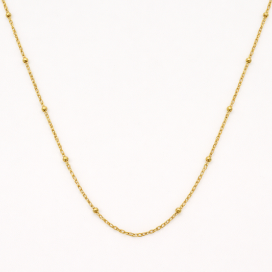 The "Necklace | Create Your Own Silver" by Salty Dreamers is a delicate chain adorned with small, evenly spaced beads, shown on a white background—an elegant handmade piece inspired by surfer jewelry.