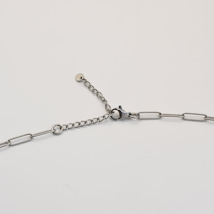 The Necklace | Paua Shell Koura by Salty Dreamers features a silver chain with clasp, ideal for showcasing its stunning pāua shell pendant or pairing with your favorite handmade earrings.