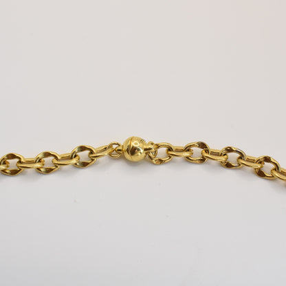 The Necklace | Ocean Dollar Gold by Salty Dreamers is a handmade gold chain with oval links and a round magnetic clasp, displayed on a white background.