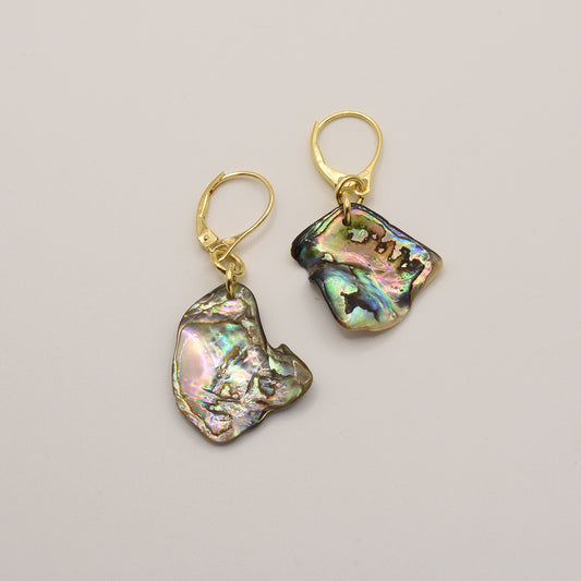 The Salty Dreamers Earrings | Paua Shell Aroha are handmade gold plated silver earrings featuring iridescent stones, adding a touch of elegance to any look.
