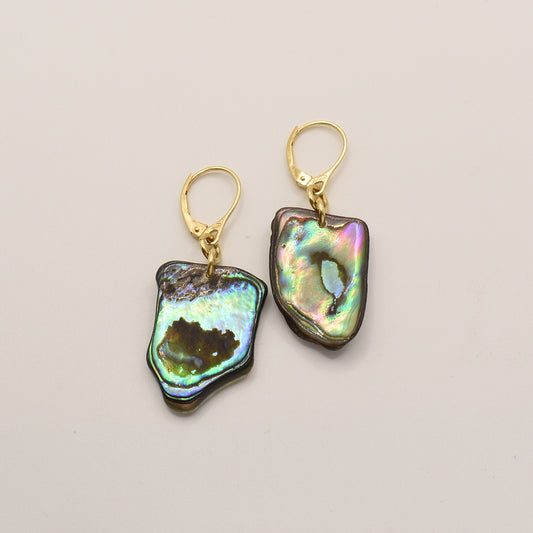 Salty Dreamers Earrings | Paua Shell Korohea feature handmade, iridescent pāua shell pieces with gold-plated 925-silver leverback hooks, shown on a plain light background.