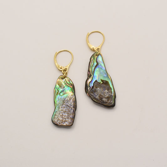 The Salty Dreamers Earrings | Paua Shell Marie feature irregular, iridescent paua shell pieces set in gold-plated silver lever-back hooks, shown on a neutral background.