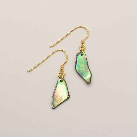 Salty Dreamers’ Earrings | Paua Shell Uru: gold hook earrings with irregular iridescent green and gold New Zealand pāua shell pendants, shown against a plain light background.