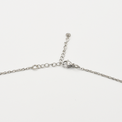 The Salty Dreamers "Necklace | Paua Shell Tu" is a handmade piece with a silver chain, adjustable extension, and lobster clasp closure, shown on a plain white background.