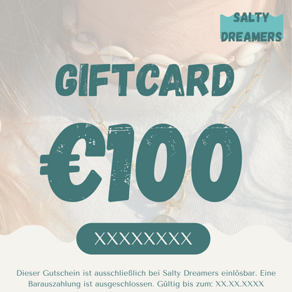 Gift card with €100 value and 'Salty Dreamers' branding on a beach background